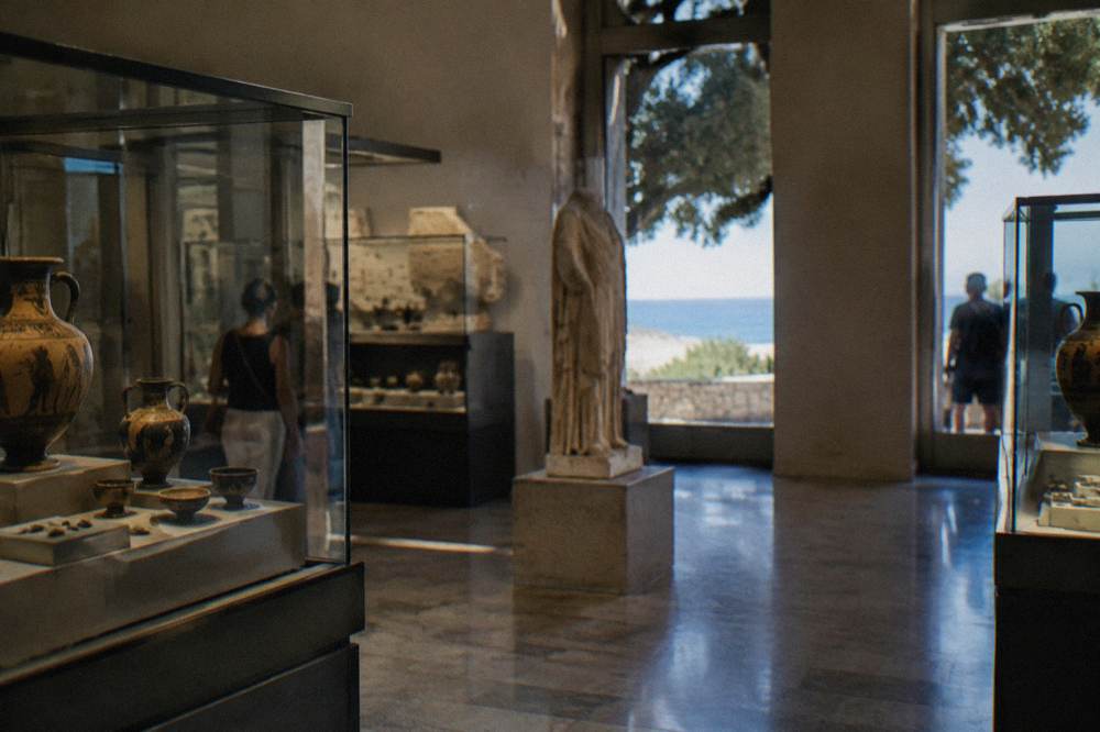 Display cases inside an archaeological museum gallery
