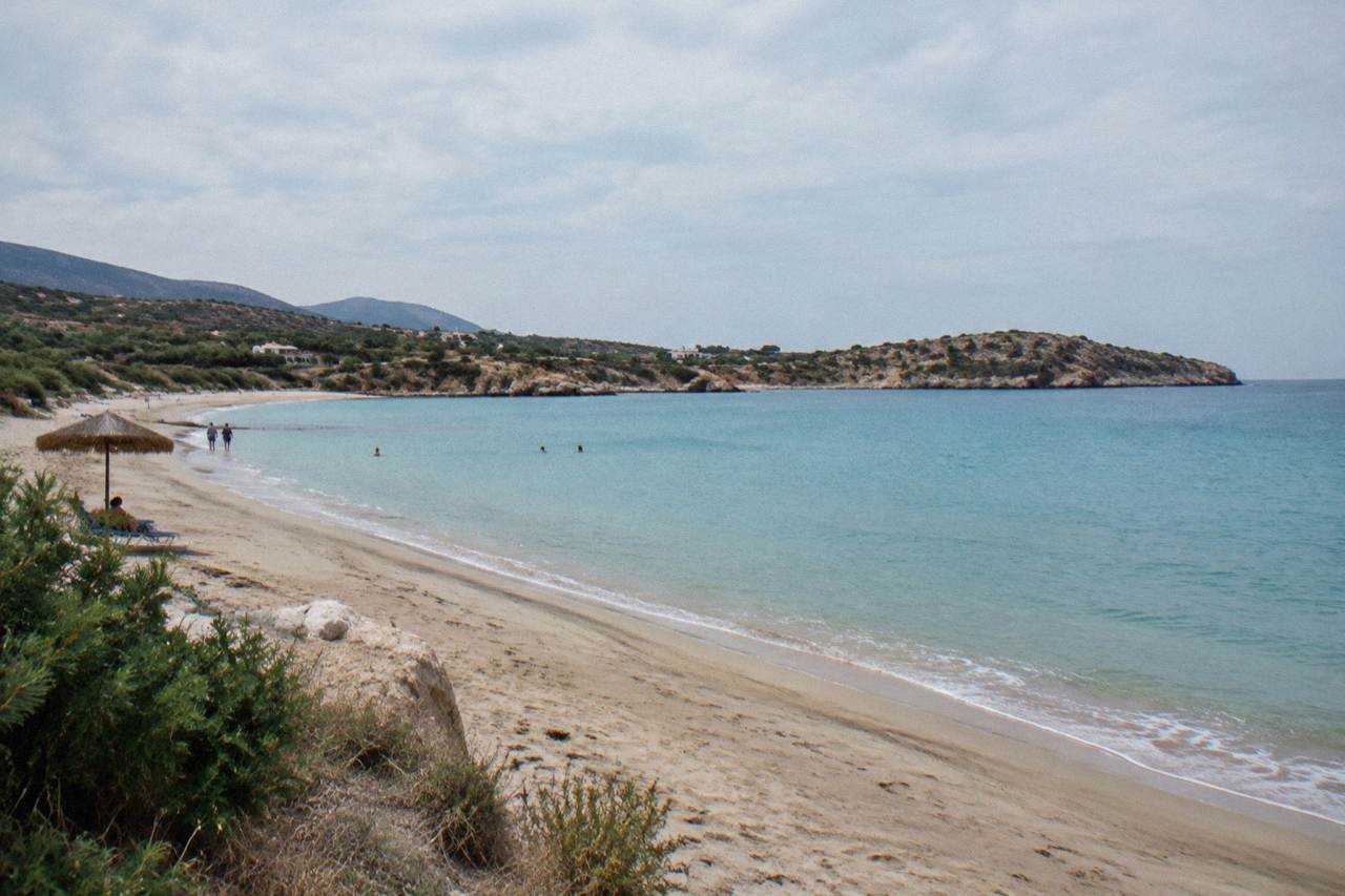 A sandy bay with calm turquoise water and low hills at Kalathas Beach on the Akrotiri peninsula near Chania