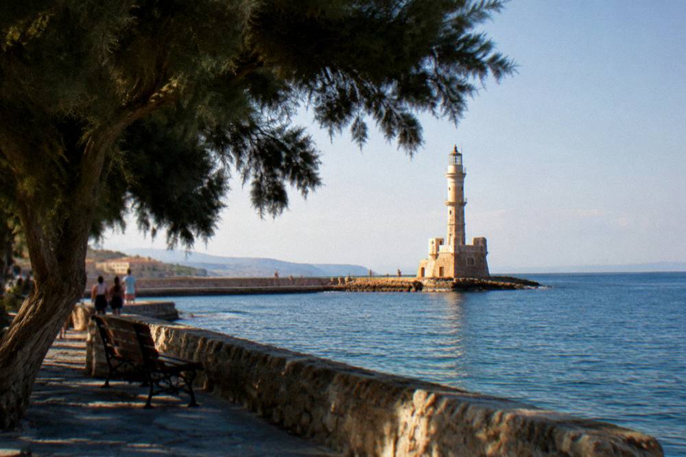 The old lighthouse of Chania in warm late afternoon light in autumn