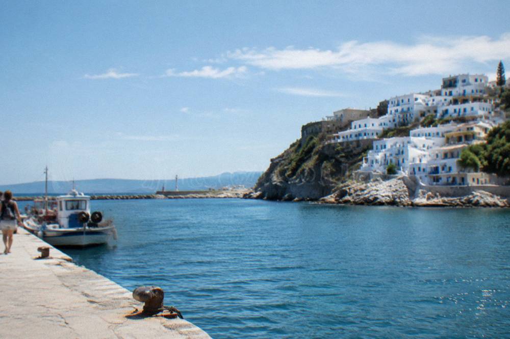 A white cliffside village above the sea on a Greek island