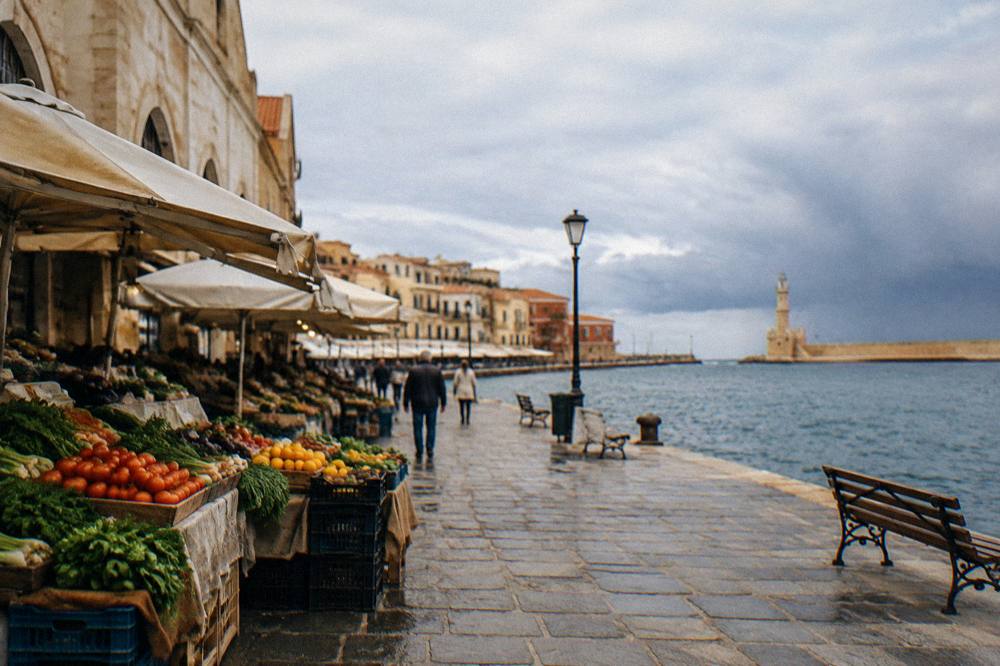 Rain clouds over the sea on the horizon seen from the Chania seafront