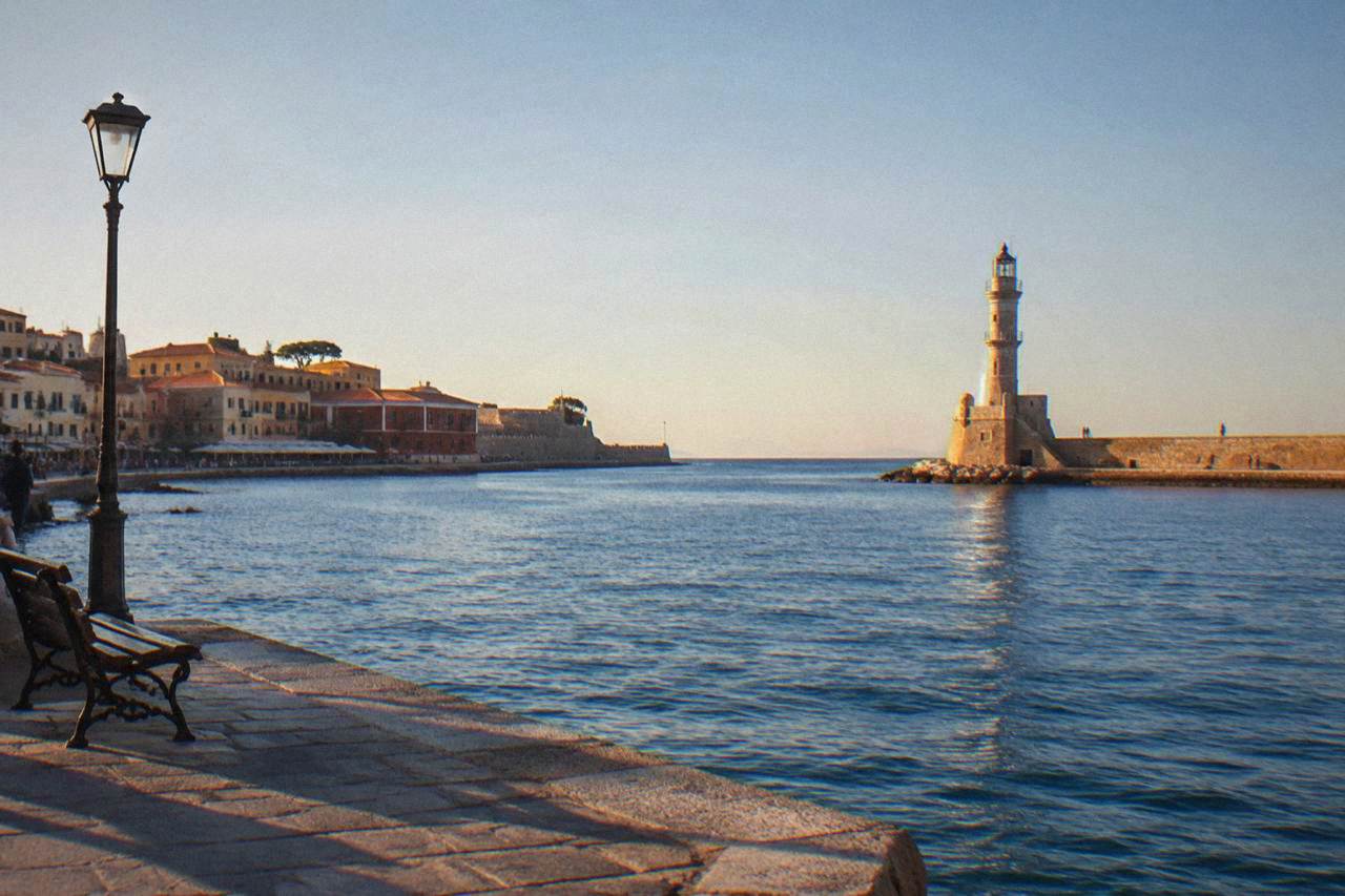 The Venetian Harbour of Chania with its lighthouse and waterfront buildings in daylight