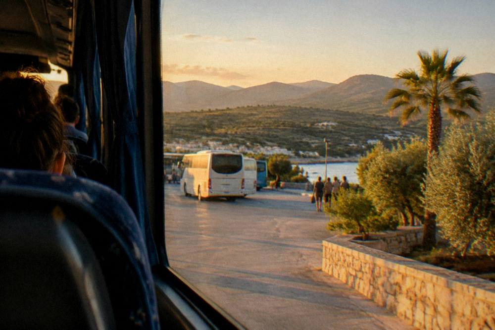 View from a bus window of Cretan hills and olive groves passing by