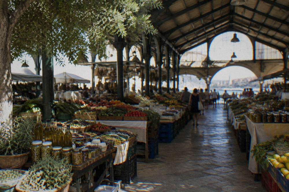 The covered Municipal Market hall in Chania with stalls of produce and olive products