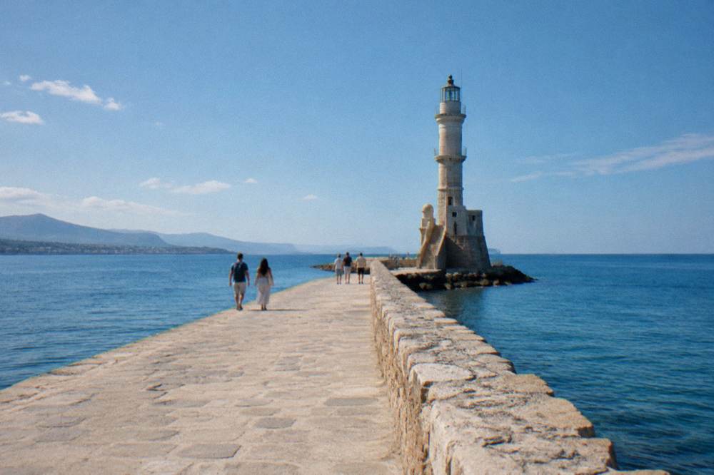The stone lighthouse at the end of the breakwater at the Venetian harbour of Chania