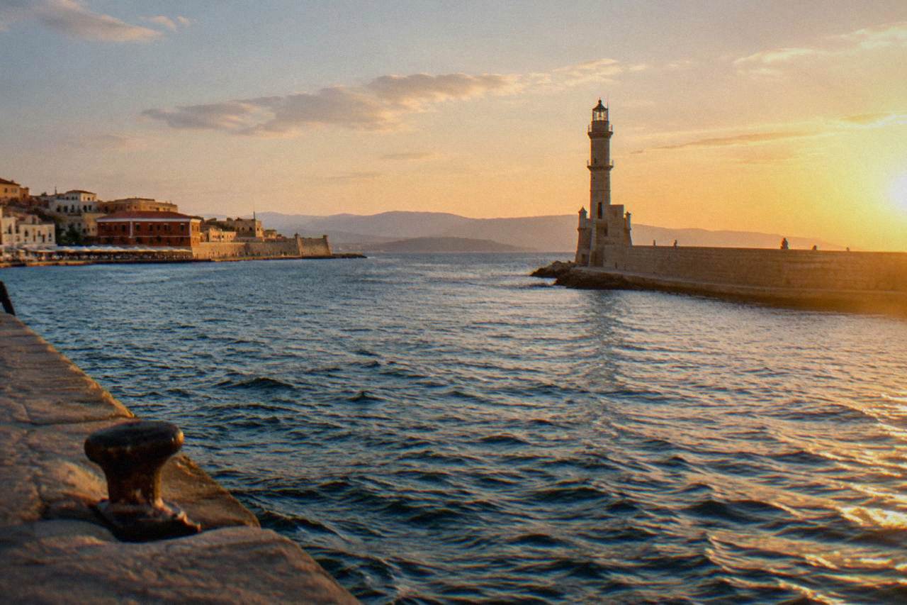 The Venetian Harbour of Chania with its lighthouse at the end of the stone mole